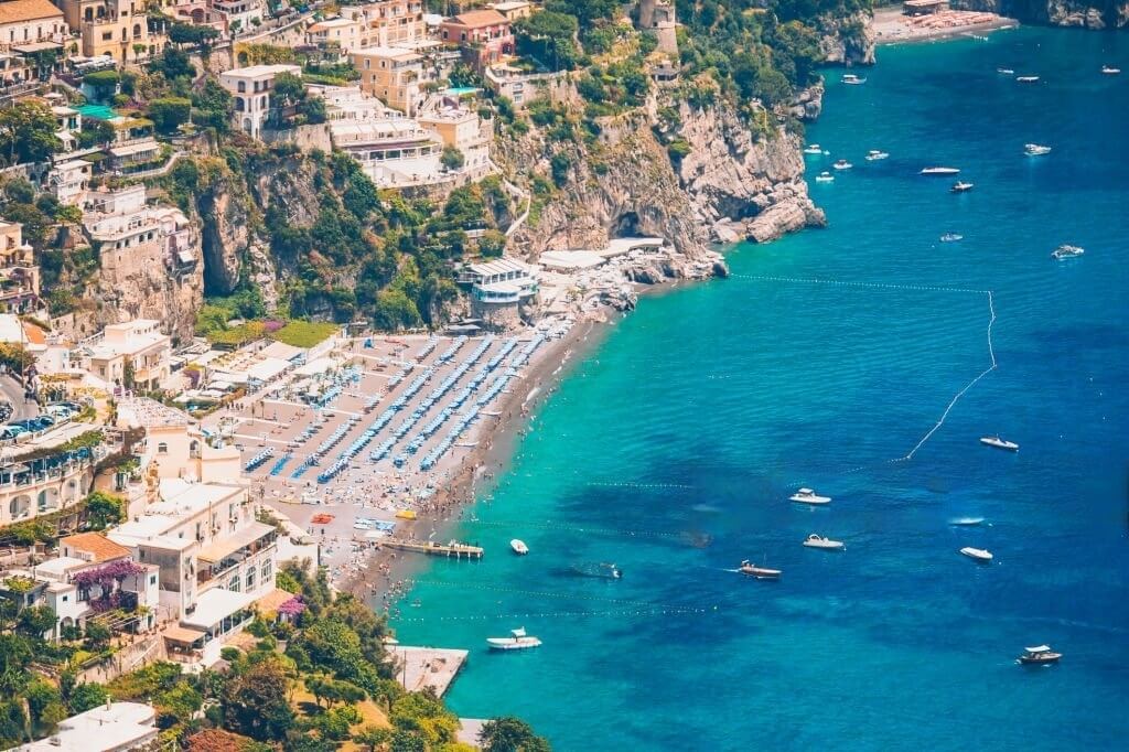 Picturesque famous and beautiful Positano, Amalfi Coast, Italy. View of popular Spiaggia Grande in Positano